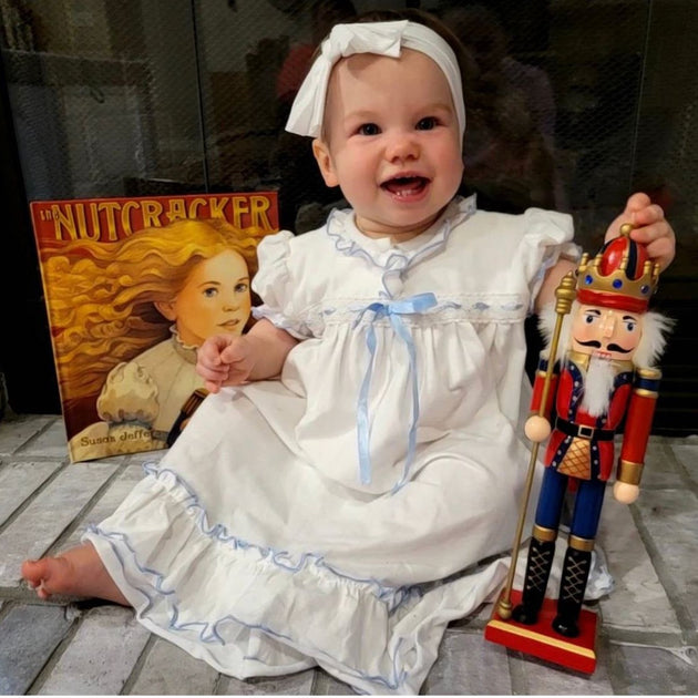 Clara Nutcracker Dress in Soft Knit Cotton with Blue Ribbon Pleats