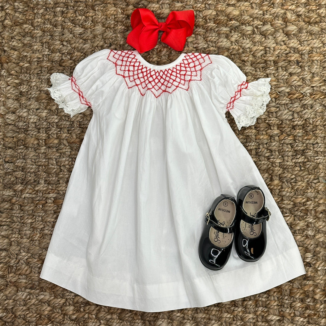 Light Heirloom Ivory Bishop Dress With Red Smocking – Pleats and Stitches