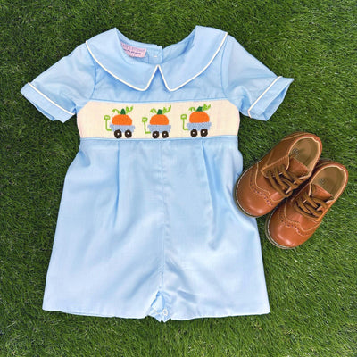 Pumpkin Smocked Shortall with Wagons on Blue