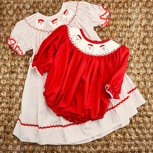 Santa Smocked Christmas Bubble Romper in Red Pleats and Stitches Santa Smocked Christmas Bubble Romper in Red Pleats and Stitches