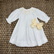 Smocked Cross Dress in White with Cream Crosses and Long Sleeves