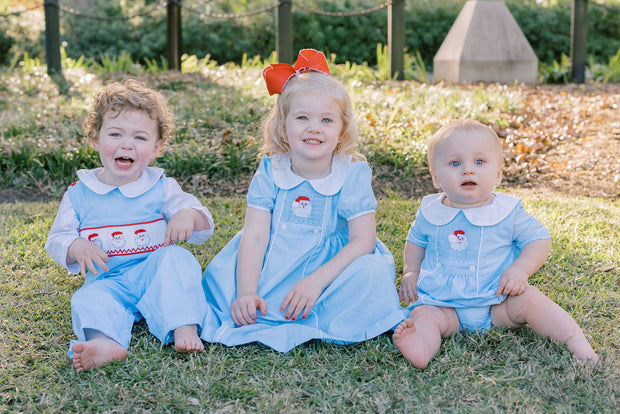 Santa Smocked Christmas Dress With Collar in Light blue Pleats and Stitches Santa Smocked Christmas Dress With Collar in Light blue Pleats and Stitches