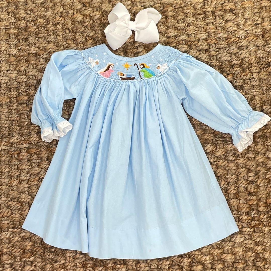 white christmas dresses Nativity Christmas Smocked Bishop Dress in Light Blue – Pleats and Stitches