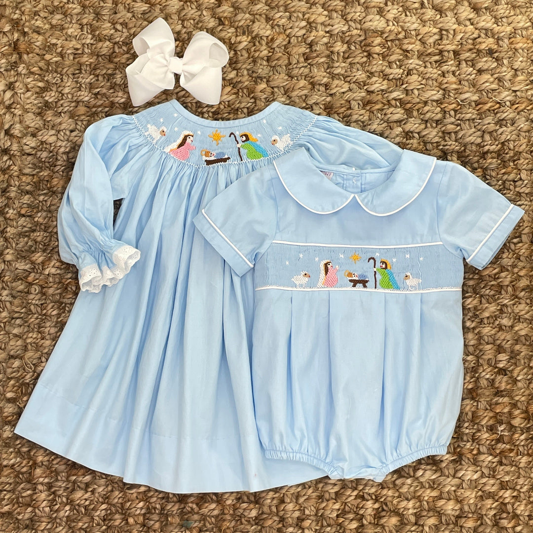 Nativity Christmas Smocked Bishop Dress in Light Blue Nativity Christmas Smocked Bishop Dress in Light Blue
